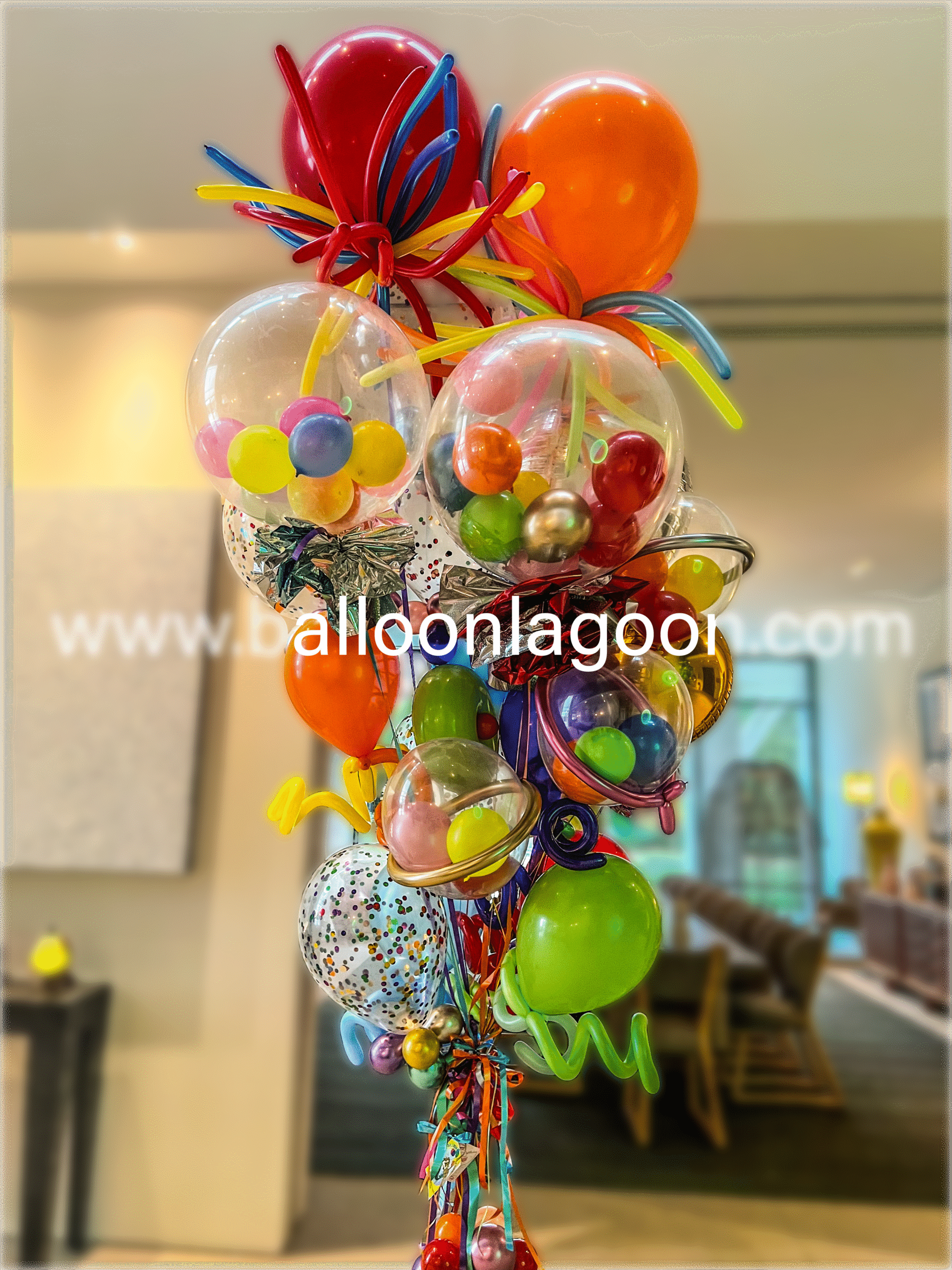 Professional summer balloon arrangement featuring vibrant colors, custom balloon decor by Beverly Hills balloon artist Balloon Lagoon