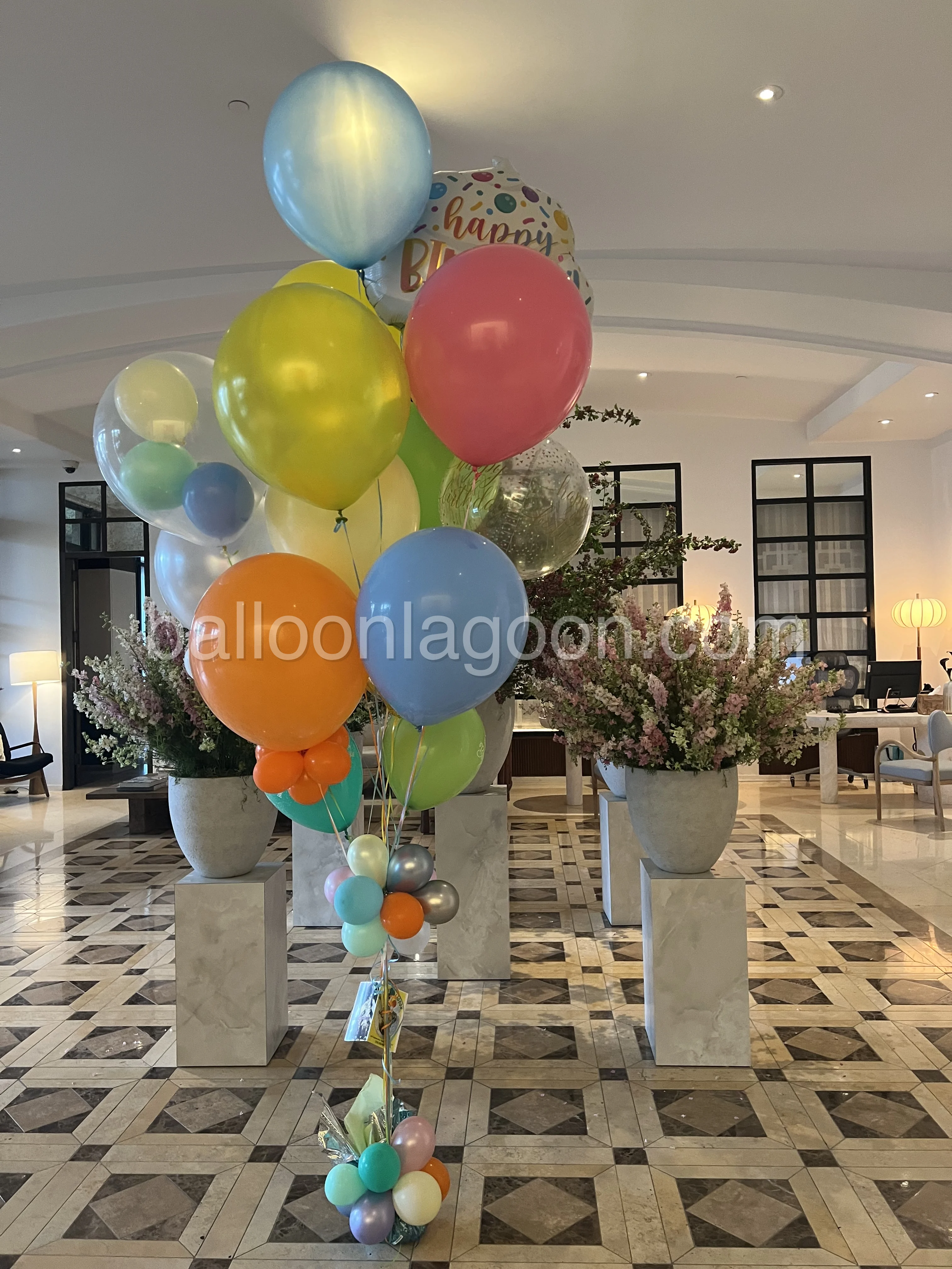 Colorful birthday balloon package-style event display in Beverly Hills